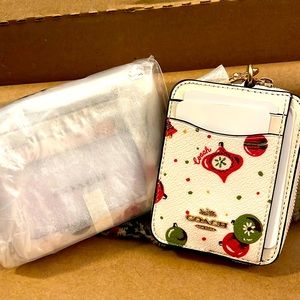 New, Authentic Coach coin/ID wristlet.